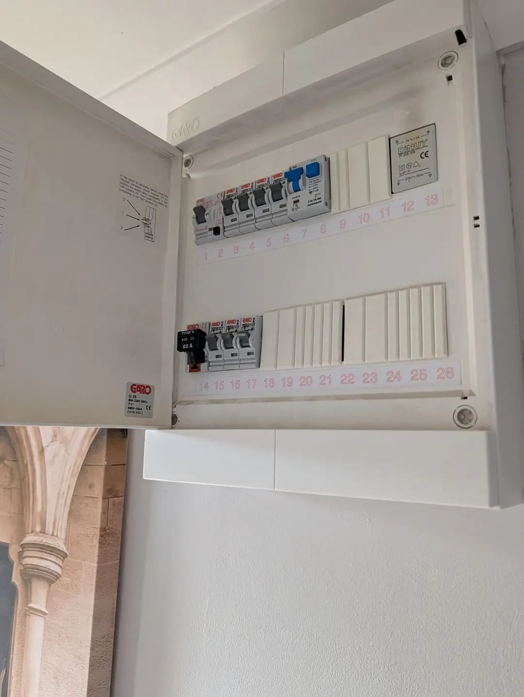Modern open consumer unit with RCDs and labelled circuit breakers